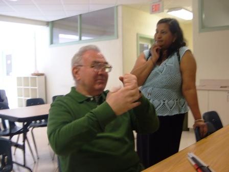 Ron demonstrates some British Sign Language.  Ron is fluent in ASL and BSL.  Iris is fluent in ASL, BSL and two Indian sign languages related to BSL.