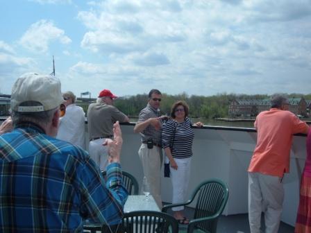 Mark Kleberg chats with Tom and Kary Hattaway on upper deck