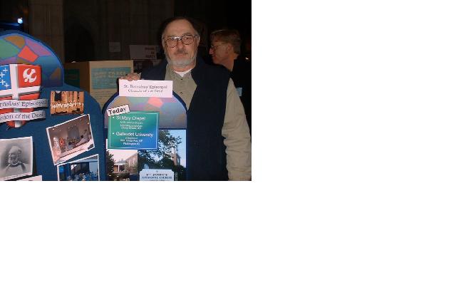 Jim Lindsay standing behind display table