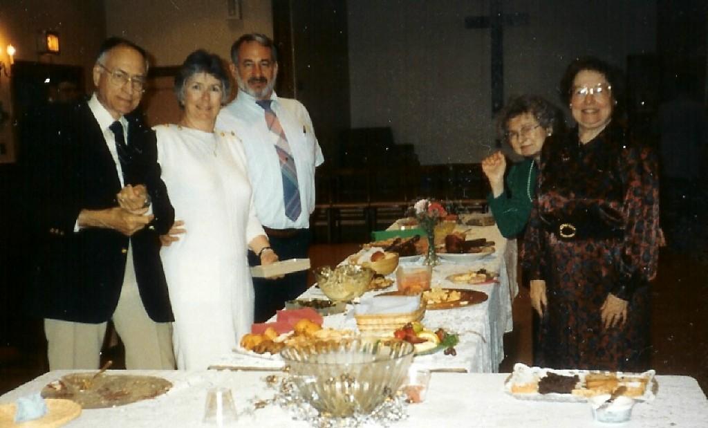 undated photo of a sort of banquet including Rudy Hines, Beth Hill and Steve Holst dressed in formal attire.